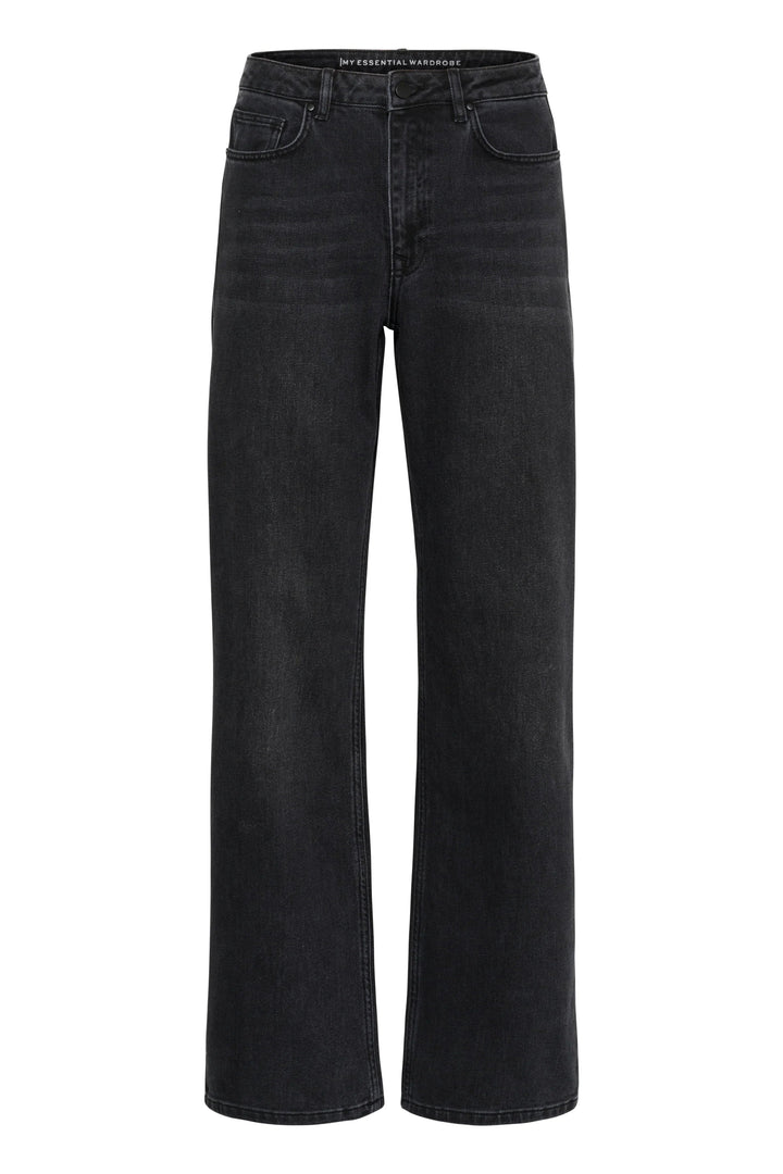Sorte jeans med femlommedesign, bæltestropper og retro vask.