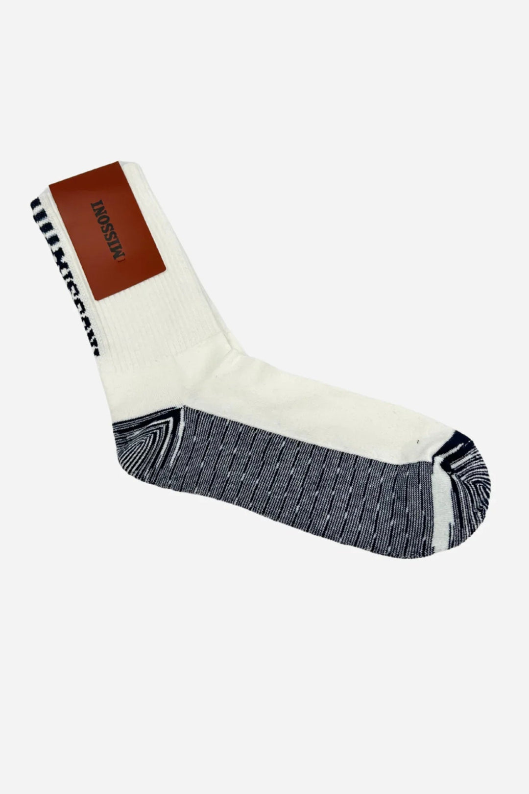Hvid sok med sorte striber ved tå og hæl. Brun etiket med "MISSONI".