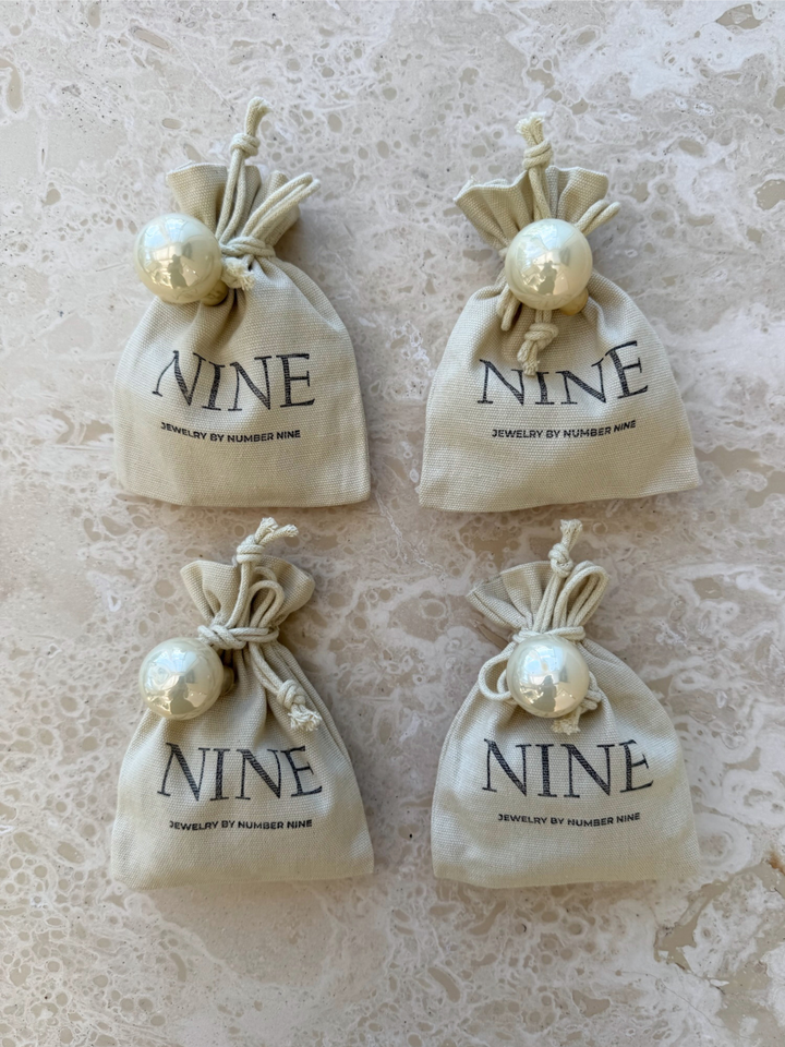 NINE - Adventskalender - 4 Smykker - Stilkompagniet.dk